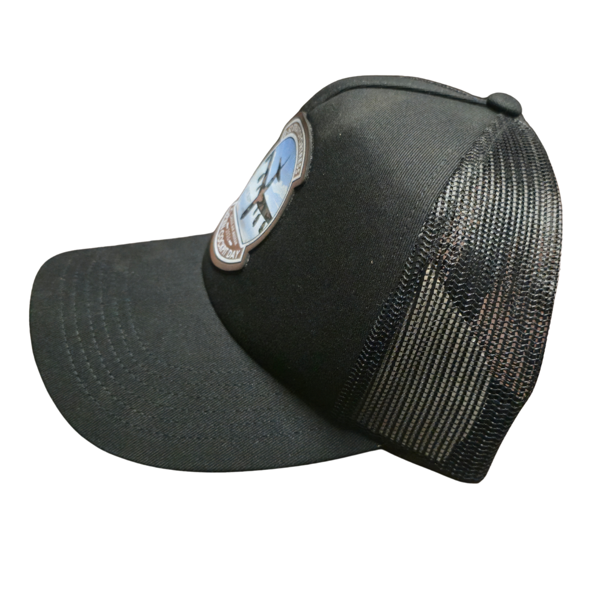 Black trucker cap with a leather B-52 patch on a white background